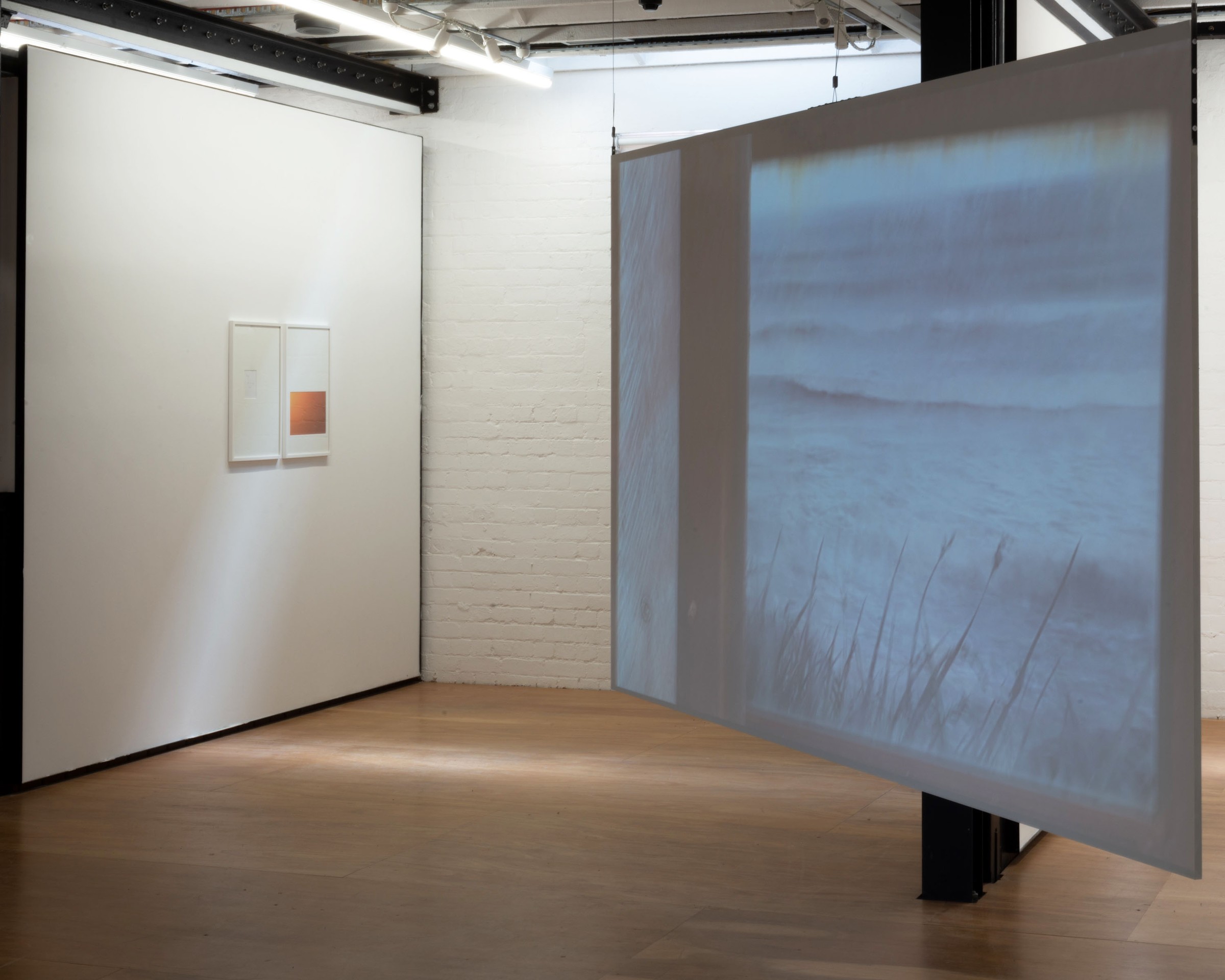 Auto Sun installation, framed diptych and projection of dunes